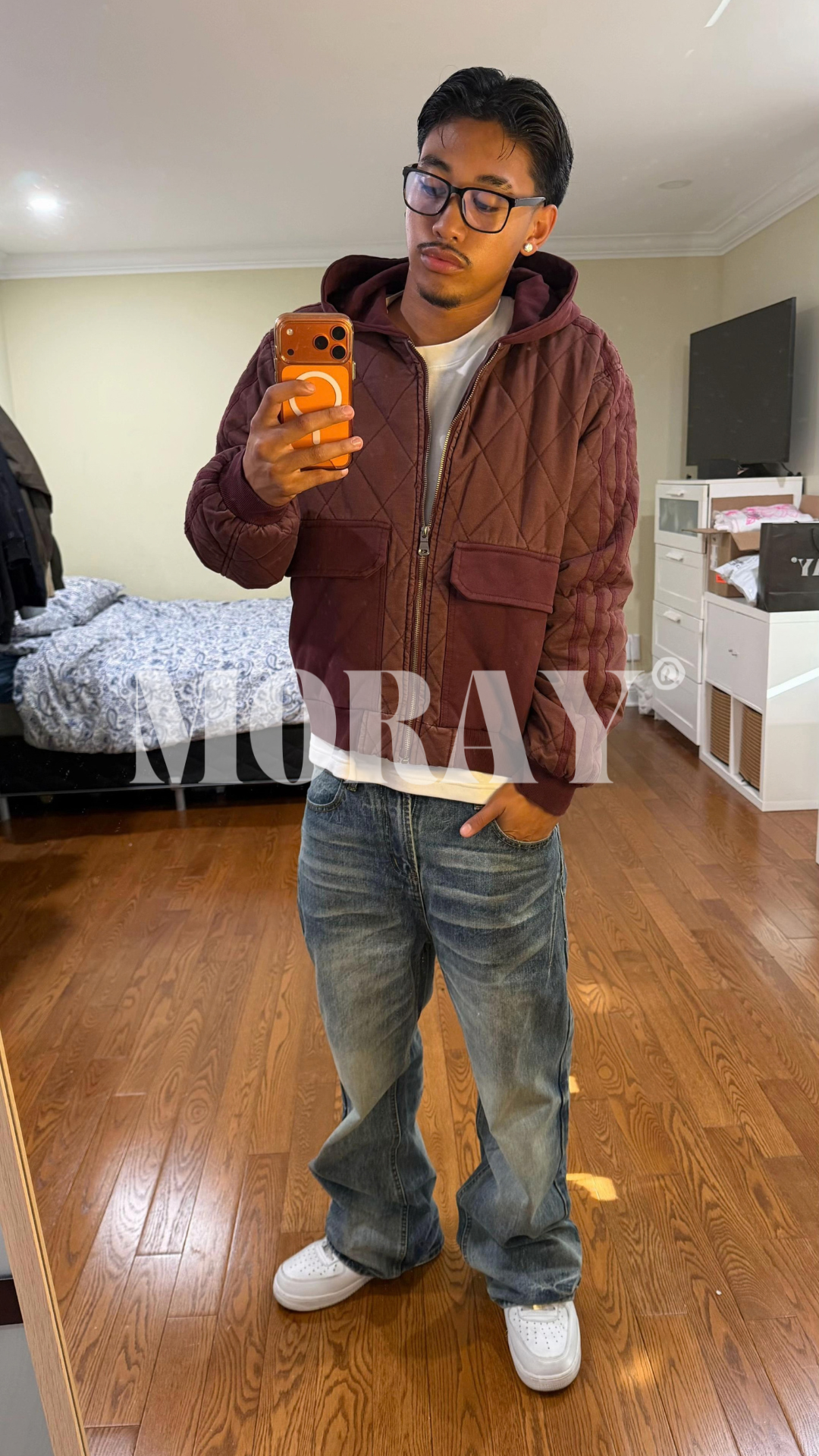 Ranger Wash combo worn: burgundy quilted jacket and light-wash jeans