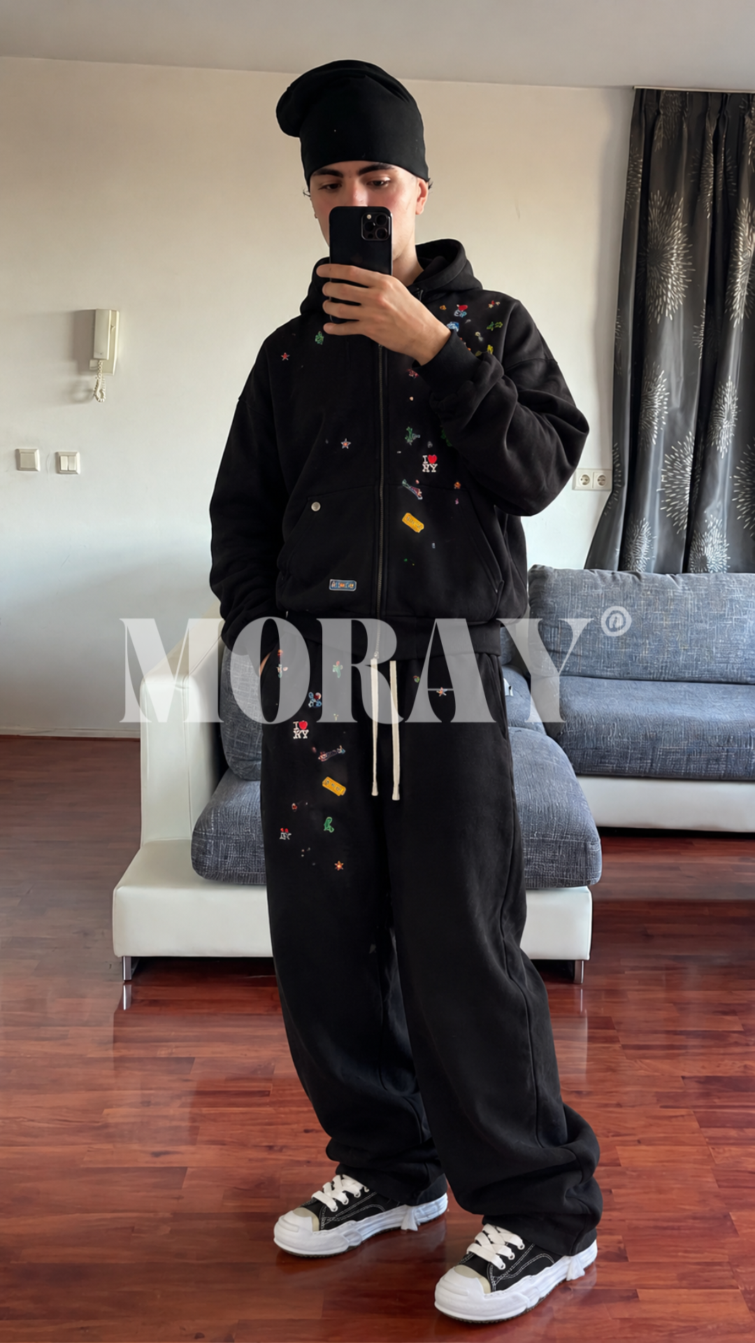 Washed Essentials combo worn: washed black zip hoodie and confetti joggers