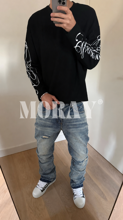 Script Drift combo worn: black script longsleeve and distressed jeans