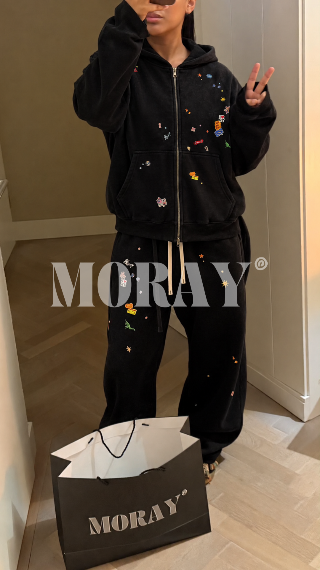 Washed Essentials outfit worn with the embroidered zip hoodie and wide joggers